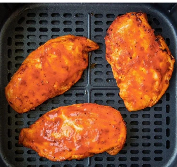 Delicious air fried buffalo chicken served with dipping sauce