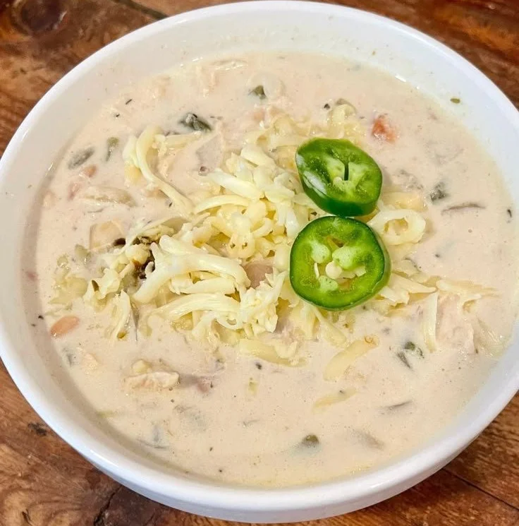 Deliciously baked focaccia bread served with white chicken chili.