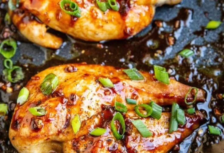Asian baked chicken breasts with flavorful marinade and herbs