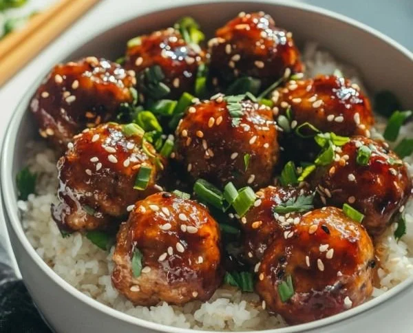 Delicious Asian meatballs cooked in a crockpot with rich flavors and spices