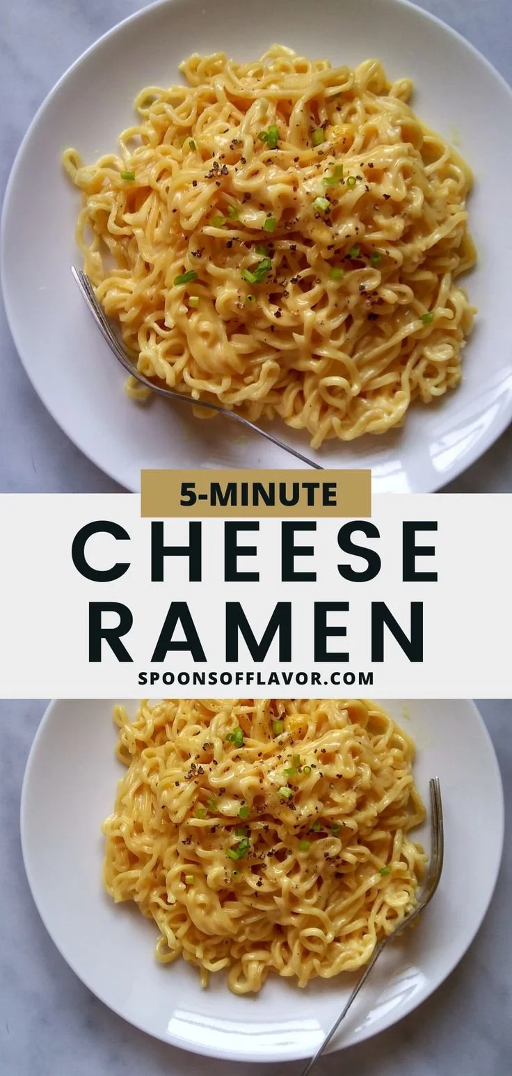Bowl of creamy cheese ramen topped with herbs and spices.