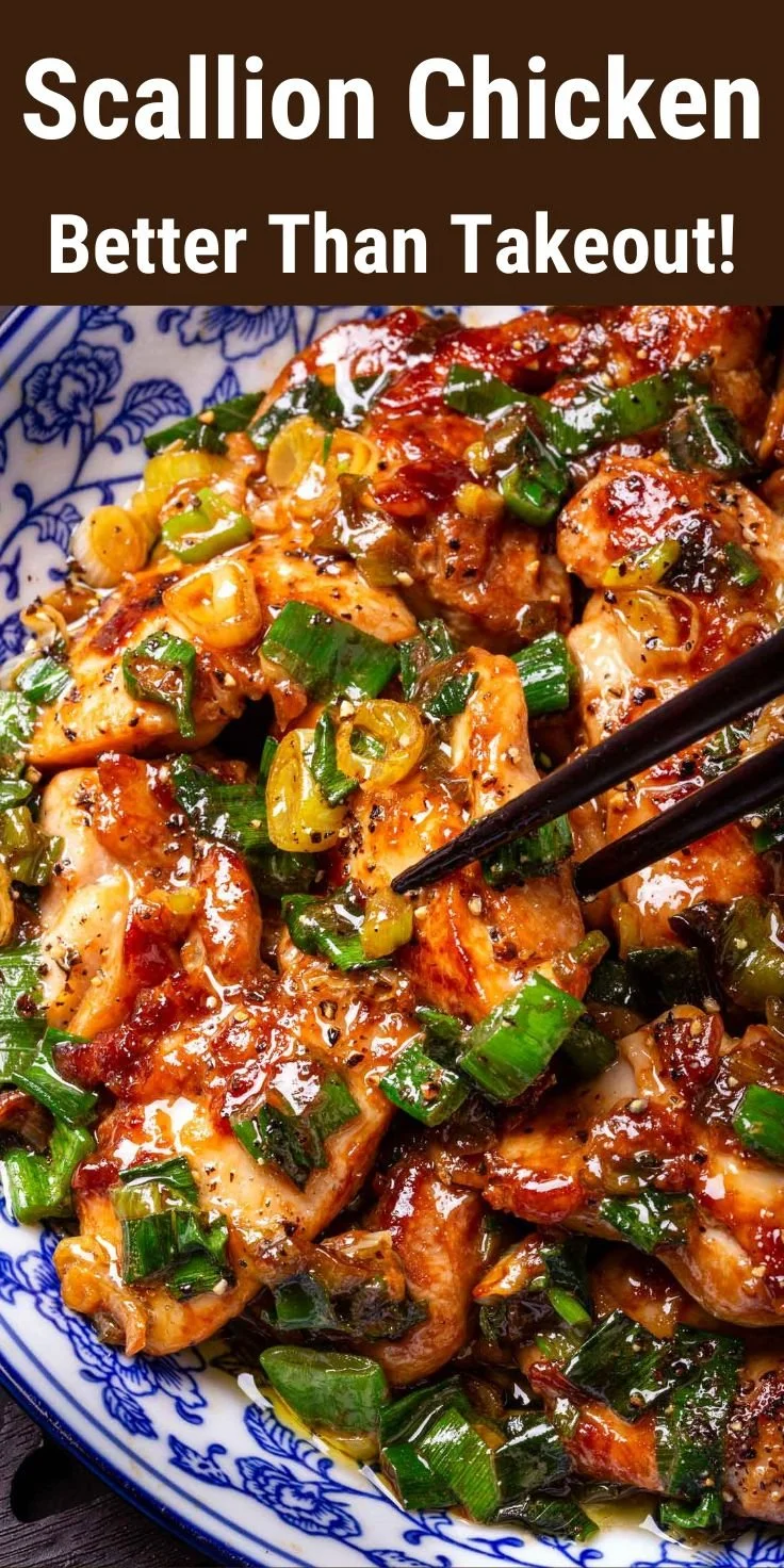 Delicious Chinese scallion chicken served with vegetables and rice