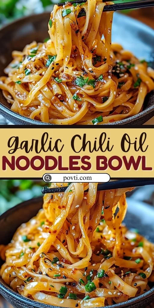 Cozy bowl of garlic chili oil noodles topped with fresh herbs and chili flakes