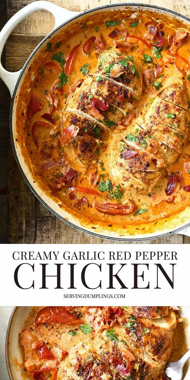Creamy Garlic Red Pepper Chicken garnished with fresh herbs on a plate.