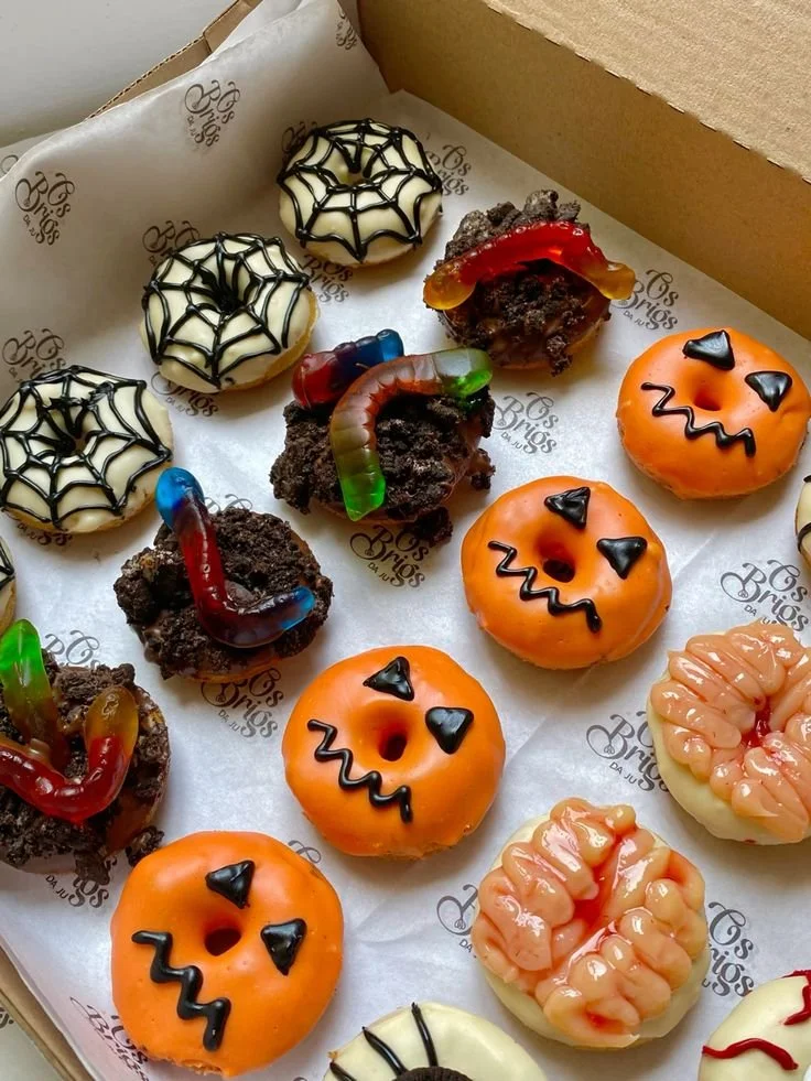 Delicious Halloween-themed donuts decorated with spooky designs