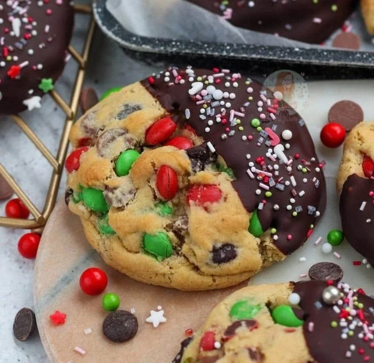 Freshly baked giant Christmas cookies decorated with icing and sprinkles