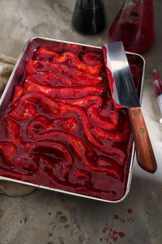Skull jello mold filled with colorful gelatin for Halloween dessert