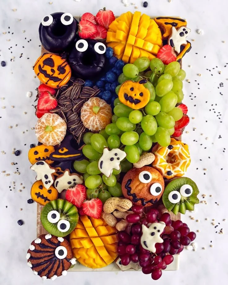Spooky Halloween platter filled with festive treats and decorations