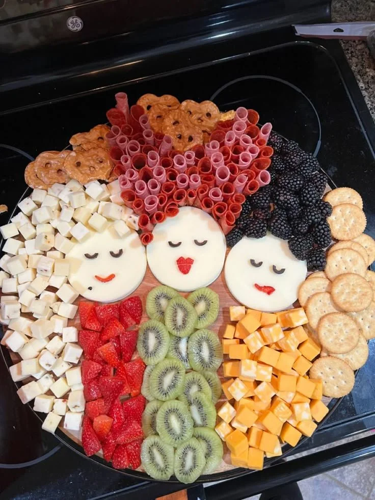 Hocus Pocus charcuterie board decorated with Halloween-themed treats