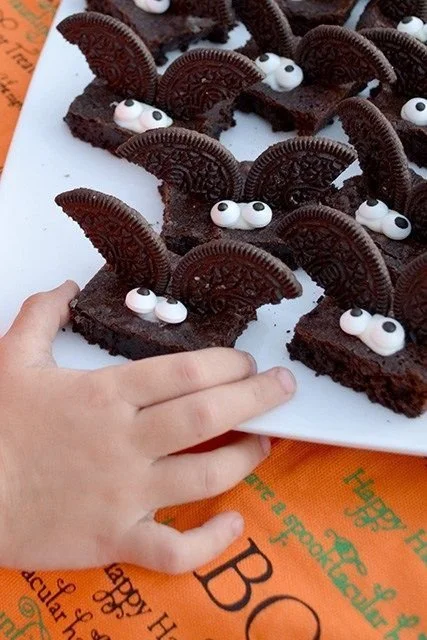 Decorative Halloween brownies shaped like bats for spooky celebrations