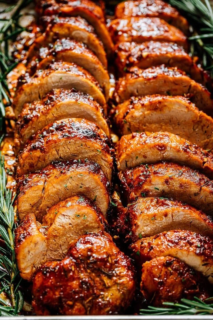 Juicy roasted pork tenderloin served with herbs and spices