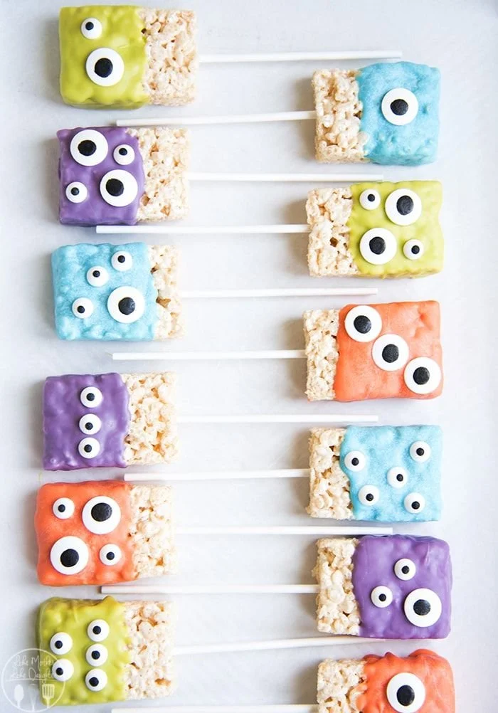Colorful Monster Rice Krispie Treats shaped like spooky monsters