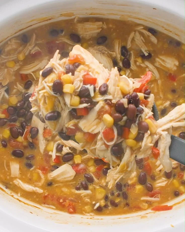 Delicious slow cooker chicken enchilada soup served in a bowl