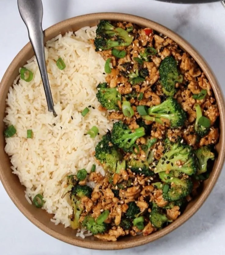 Spicy chicken and broccoli stir-fry served in a colorful bowl