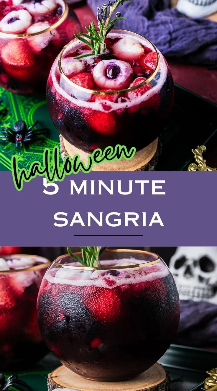 Gorgeous Halloween Sangria filled with spooky fruits and garnishes