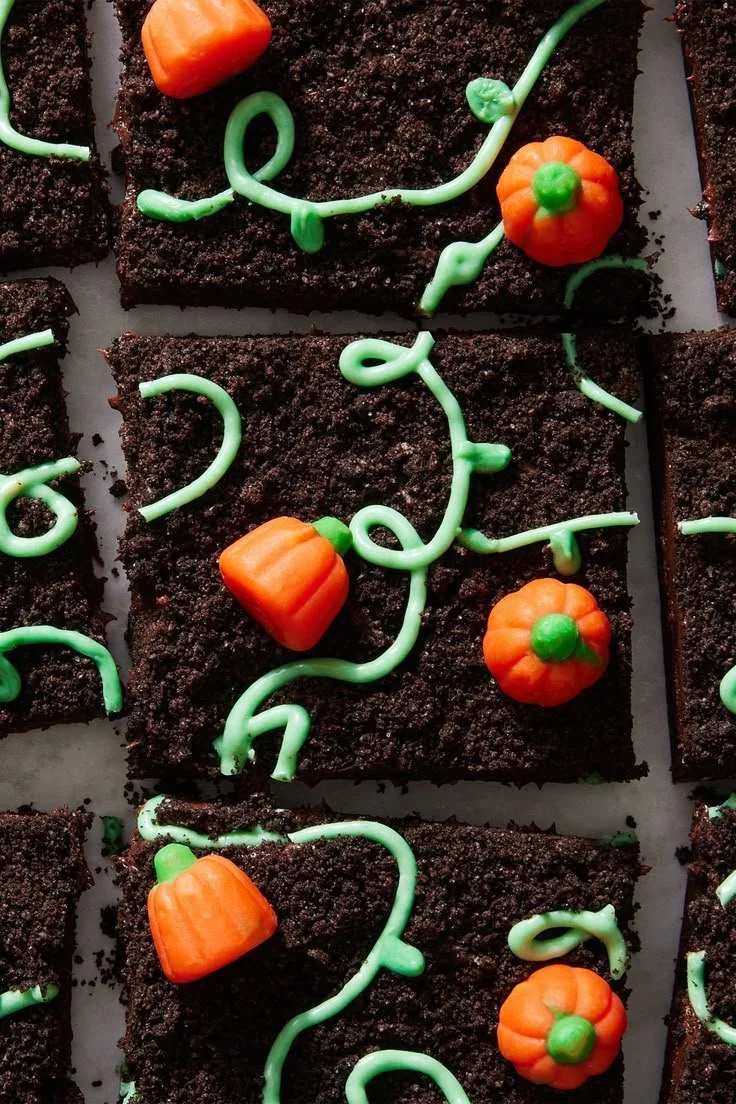 Festive Halloween desserts including spooky cupcakes and cute pumpkin treats.