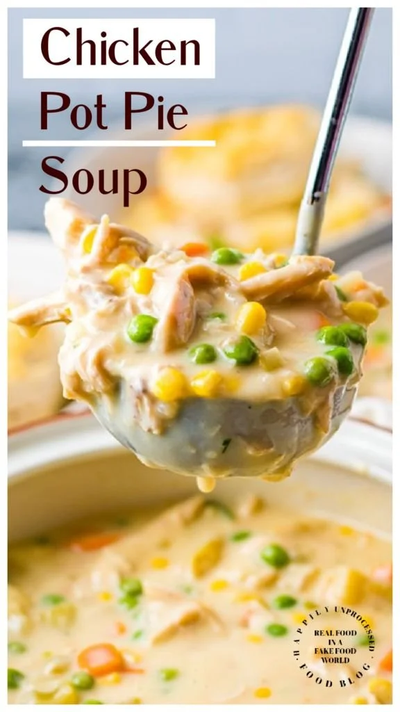 A warm bowl of Chicken Pot Pie Soup topped with herbs and fresh vegetables
