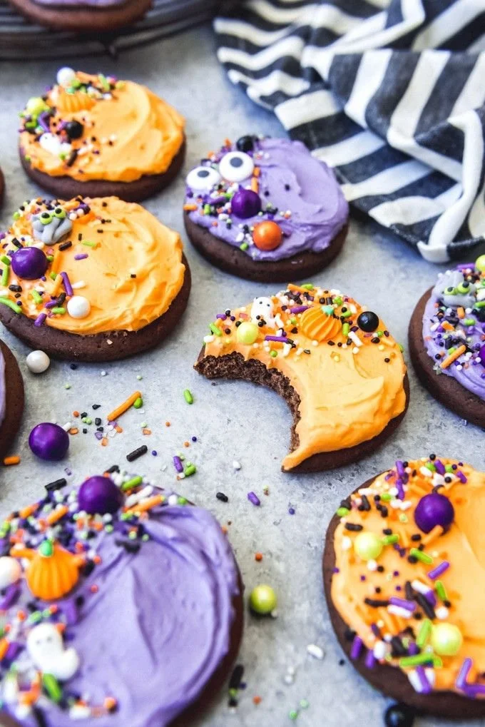 Chocolate Lofthouse frosted sugar cookies on a colorful plate