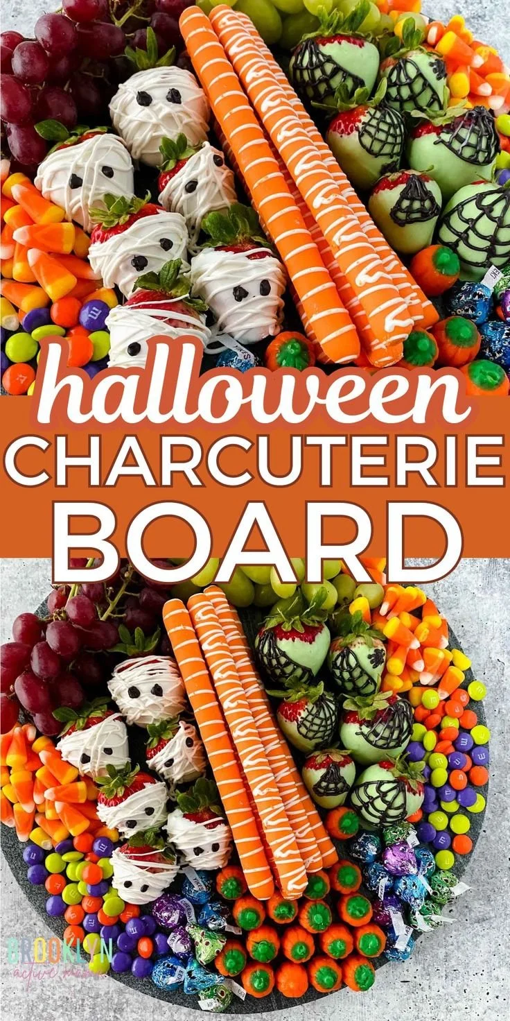 Festive Halloween charcuterie board featuring seasonal treats and decorations.