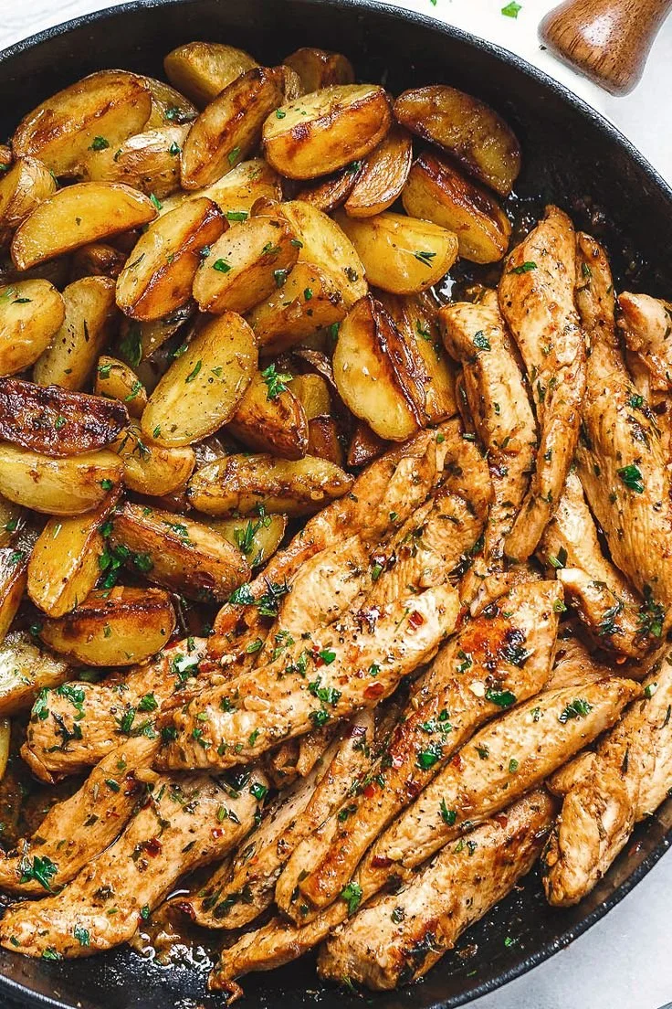 Delicious Garlic Butter Chicken served with potatoes on a plate