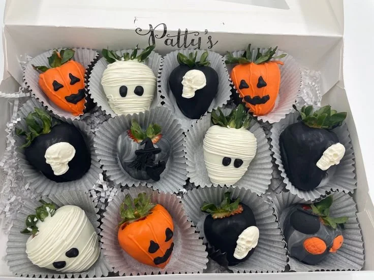 Halloween chocolate covered strawberries decorated for festive celebrations