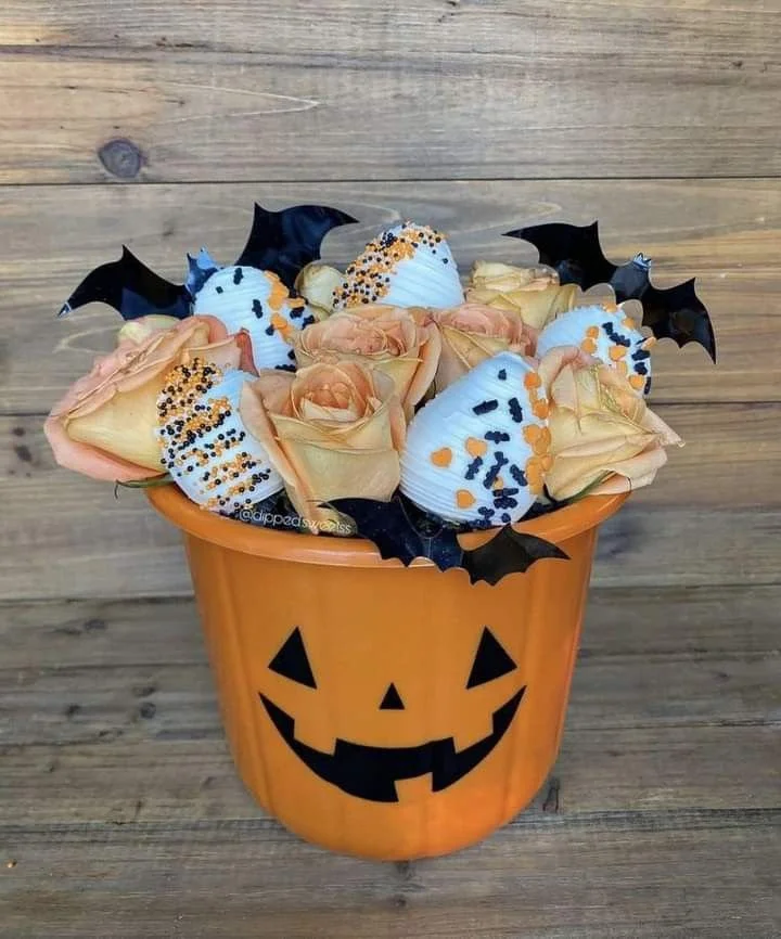Halloween chocolate covered strawberries in a festive arrangement