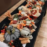 halloween food and decorations on long table cui 2026 08 06 180319 1