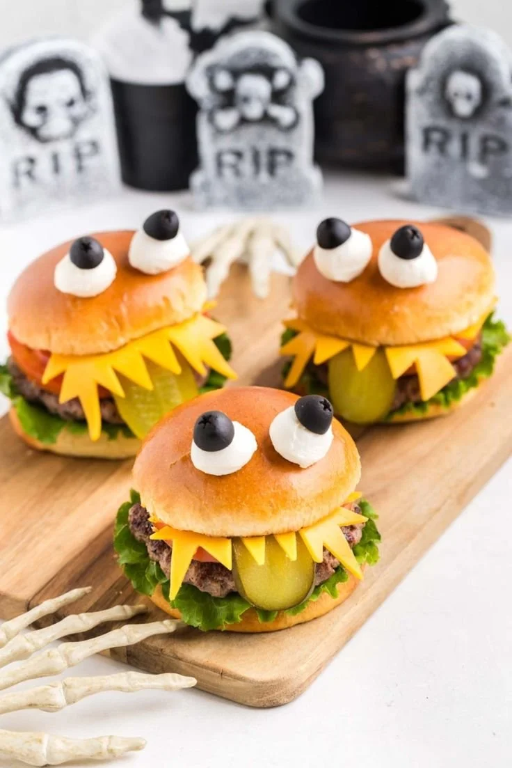 A spooky monster burger perfect for Halloween parties, featuring creative toppings.