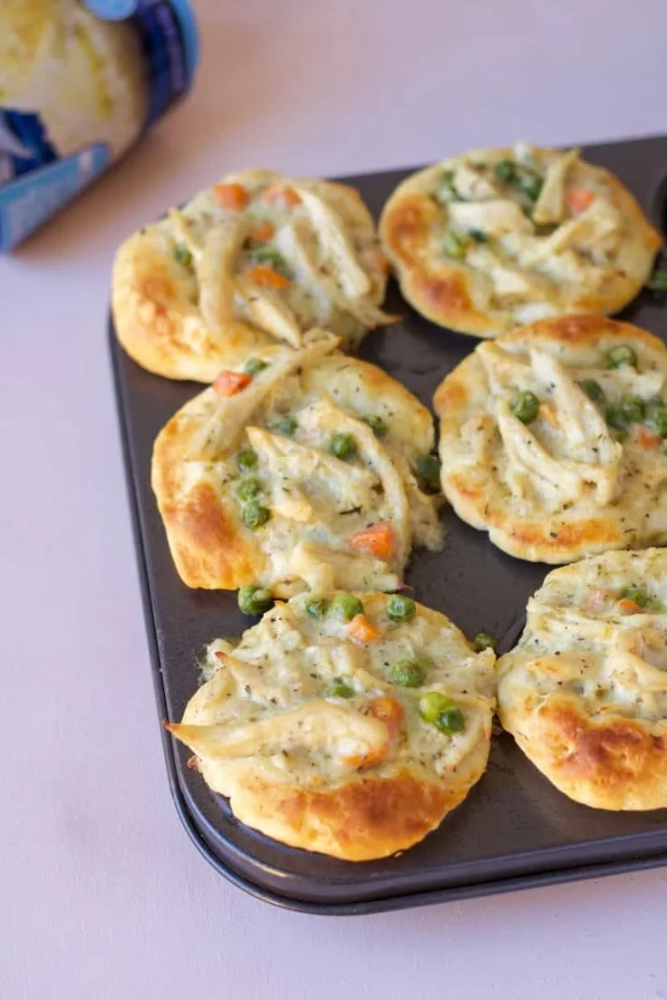 Mini chicken pot pies made with Grands biscuits, perfect for easy meals.