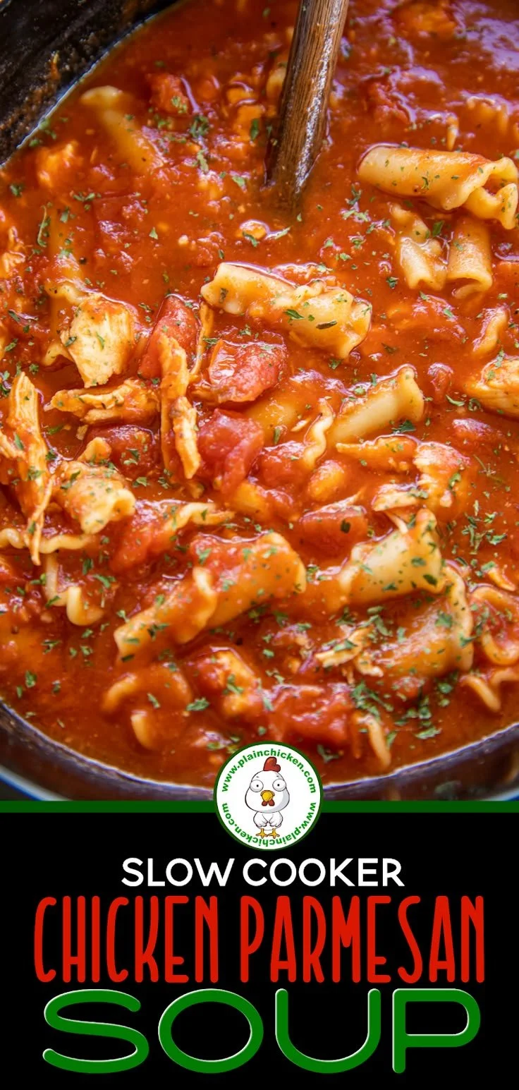 Bowl of creamy slow cooker chicken parmesan soup garnished with parsley.