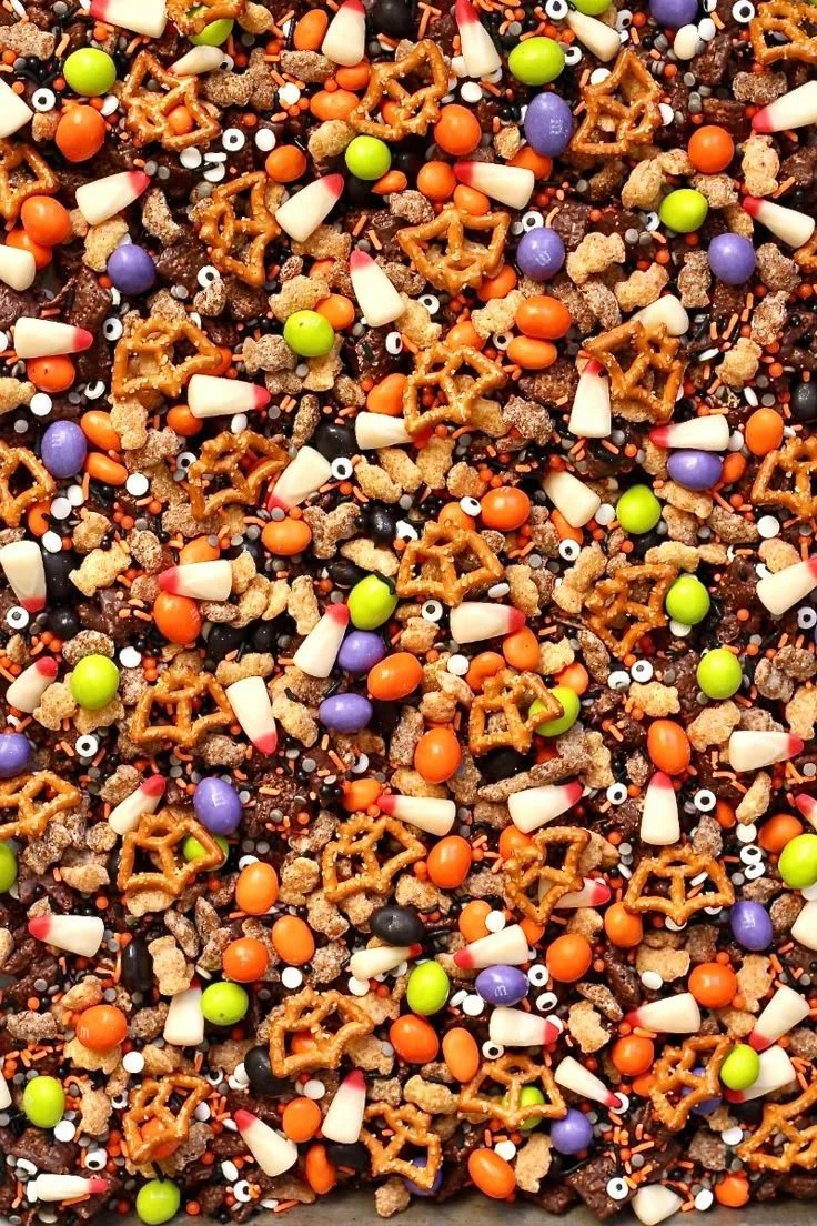 Colorful Halloween snack mix with candies and treats for spooky celebrations