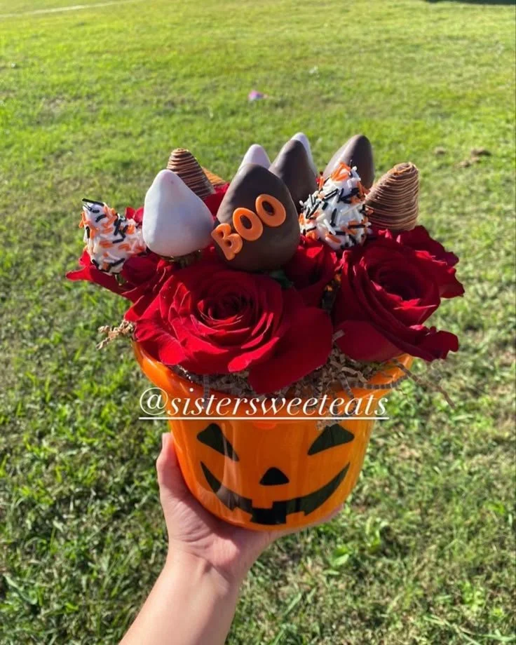 Strawberry Boo Basket filled with Halloween treats and decorations.