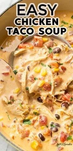Creamy chicken taco soup in a bowl topped with cilantro and lime