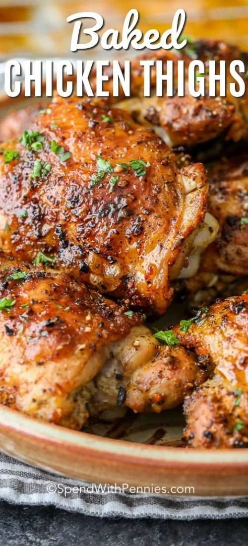 Healthy oven baked chicken thighs with lemon seasoning on a plate