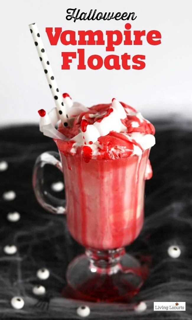 Vampire Blood White Hot Chocolate topped with spooky decorations for Halloween.
