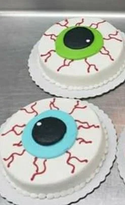 Halloween cake decorations with spooky designs and festive elements for festive cakes